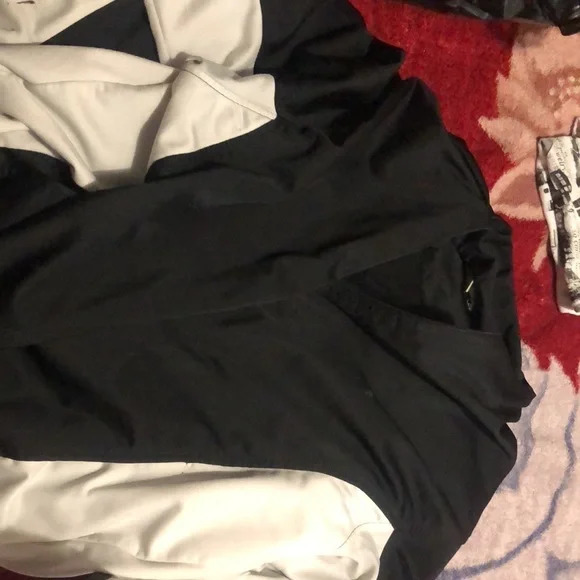 I am selling a Chicago shirt That is medium.Another shirt that's large a jacket - Picture 3 of 3